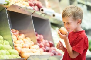 http://www.dreamstime.com/royalty-free-stock-photography-little-boy-choosing-bio-apple-food-fruit-vegetable-shopping-store-image29720357