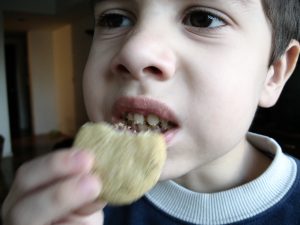 Child eating cookie