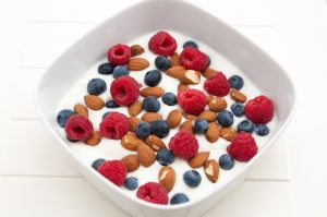 Yoghurt with fresh fruits and almonds