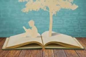 10734479 - paper cut of children read a book under tree