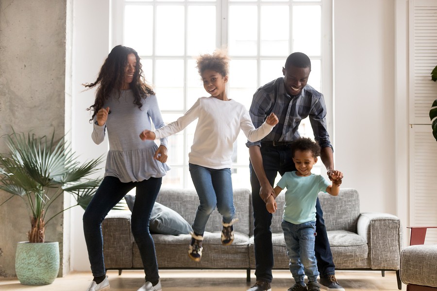 Happy Family Dancing At Home